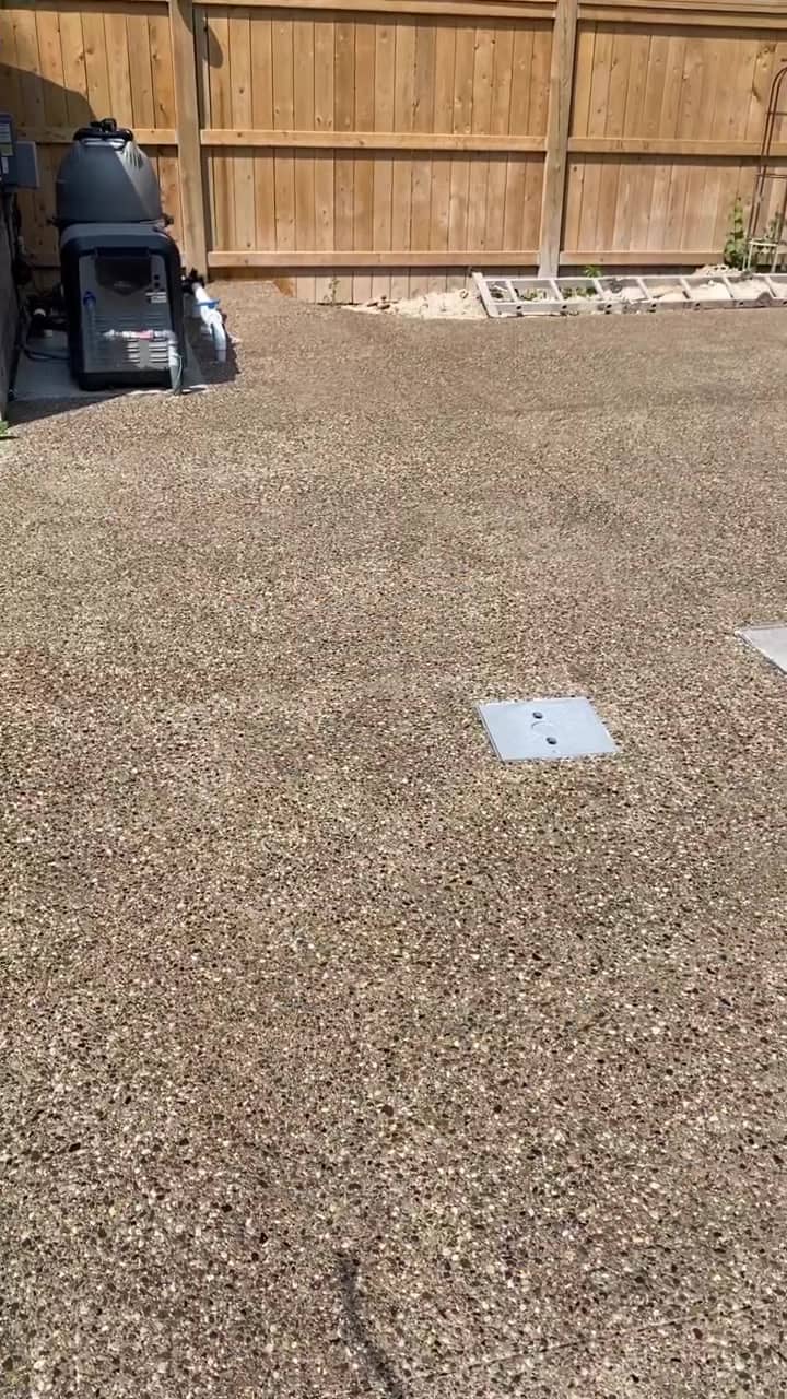 Exposed aggregate driveway after a repair